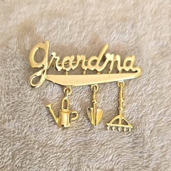 Jewelry - #190 Gold Tone Grandma Brooch with Gardening Charms